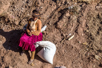 Woman Waiting with a Bag