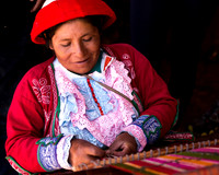 Peruvian Woman Demonstrates Weaving