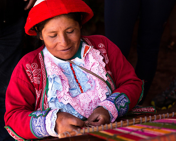 Peruvian Woman Demonstrates Weaving